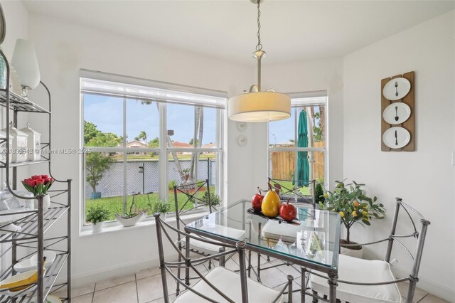 9364 SW 164th Ct, Miami, FL 33196 - dining area with light tile patterned floors and baseboards