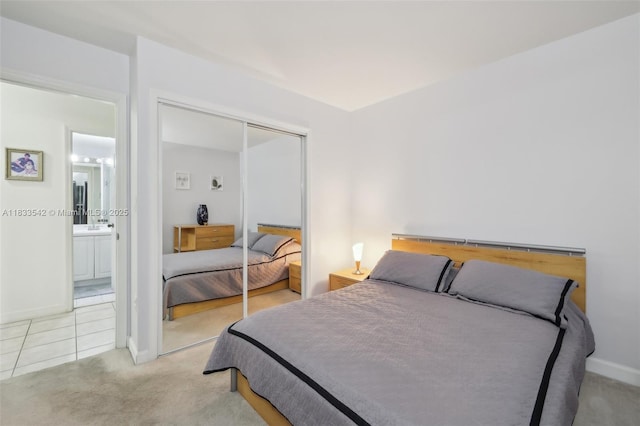 9364 SW 164th Ct, Miami, FL 33196 - tiled bedroom with carpet and a closet