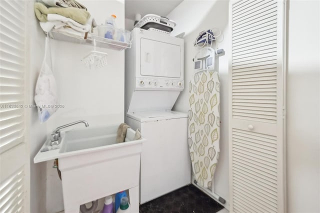 9364 SW 164th Ct, Miami, FL 33196 - laundry room featuring stacked washer / drying machine