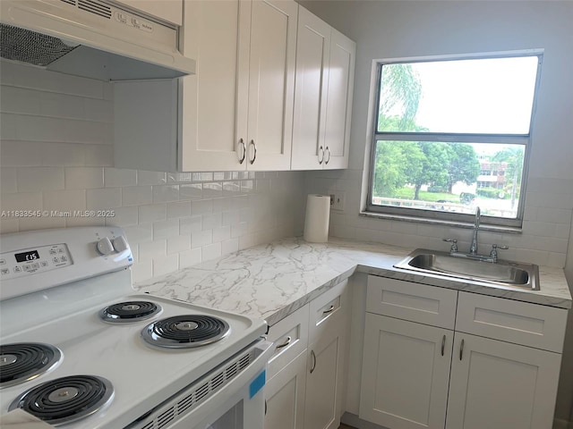 8861 Sunrise Lakes Blvd Unit 307, Sunrise, FL 33322 - kitchen with white range with electric stovetop, exhaust hood, backsplash, light countertops, and white cabinets
