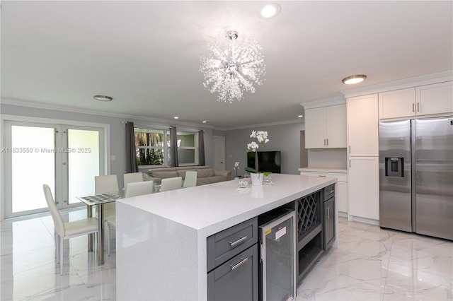 4326 Jackson St, Hollywood, FL 33021 - kitchen featuring stainless steel fridge with ice dispenser, wine cooler, white cabinets, a chandelier, and recessed lighting