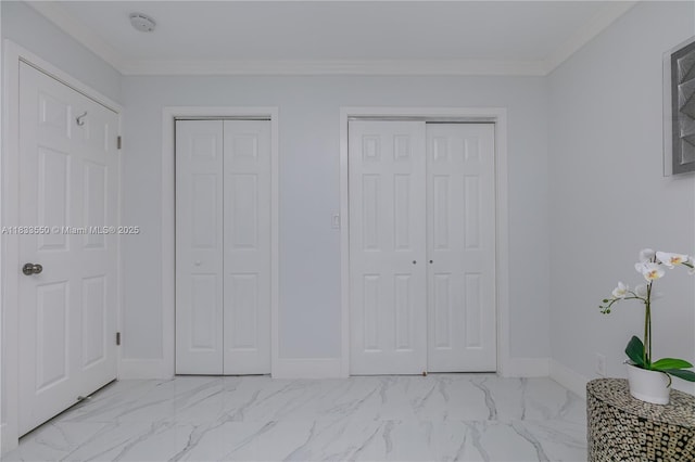4326 Jackson St, Hollywood, FL 33021 - bedroom with two closets, light marble finish flooring, and ornamental molding