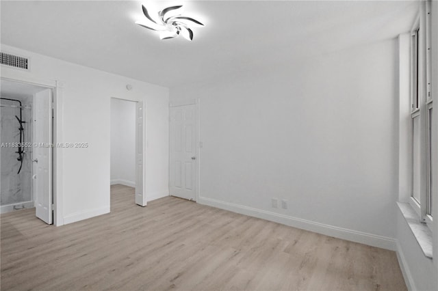 1391 S Ocean Blvd Unit 704, Pompano Beach, FL 33062 - unfurnished bedroom with light wood-type flooring and baseboards