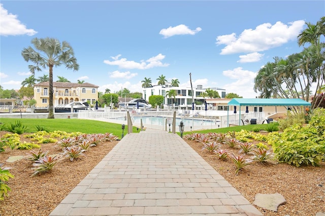1391 S Ocean Blvd Unit 704, Pompano Beach, FL 33062 - view of home's community featuring a pool and a water view