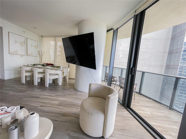 801 S Miami Ave Unit 4204, Miami, FL 33130 - living area featuring light wood finished floors and floor to ceiling windows