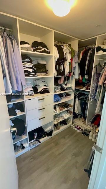16385 Biscayne Blvd Unit 2702, North Miami Beach, FL 33160 - walk in closet with wood finished floors