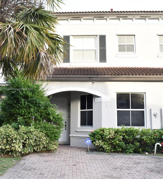9123 SW 152nd Path, Miami, FL 33196 - back of house featuring stucco siding and a tile roof
