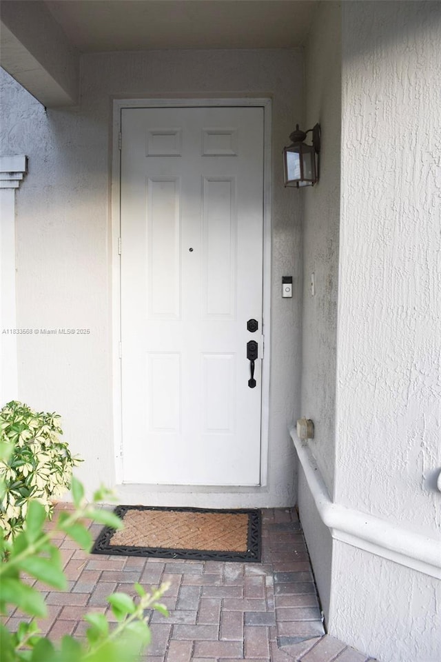 9123 SW 152nd Path, Miami, FL 33196 - property entrance with stucco siding