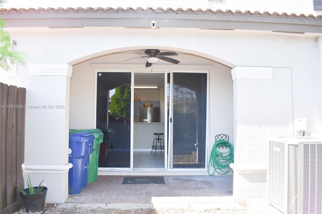 9123 SW 152nd Path, Miami, FL 33196 - entrance to property with stucco siding, a ceiling fan, and a tiled roof