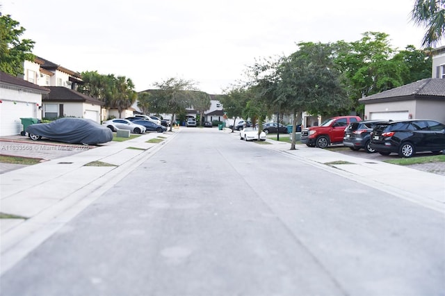 9123 SW 152nd Path, Miami, FL 33196 - view of asphalt street with sidewalks, a residential view, and curbs