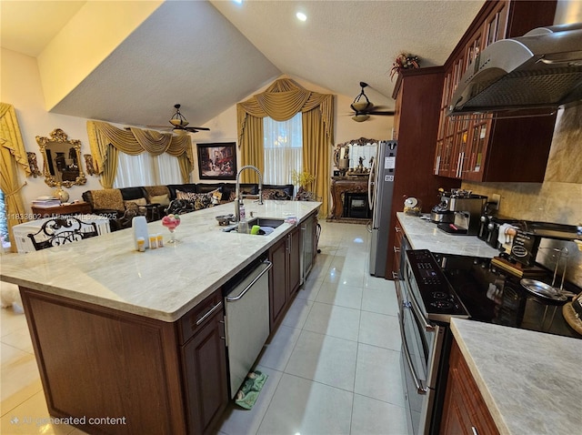 15126 NW 90th Ct, Miami Lakes, FL 33018 - kitchen with appliances with stainless steel finishes, ventilation hood, a ceiling fan, open floor plan, and lofted ceiling