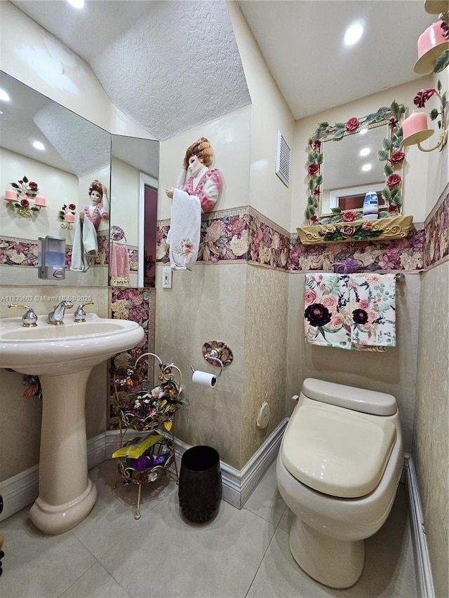 15126 NW 90th Ct, Miami Lakes, FL 33018 - half bath featuring tile patterned floors, wainscoting, recessed lighting, and baseboard heating