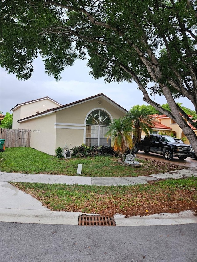 15126 NW 90th Ct, Miami Lakes, FL 33018 - view of front of house featuring stucco siding