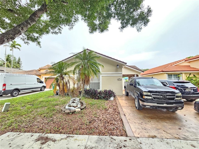 15126 NW 90th Ct, Miami Lakes, FL 33018 - view of front of house with stucco siding