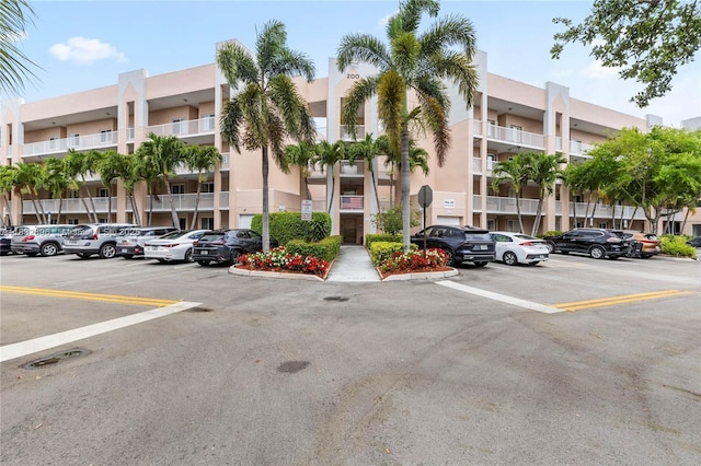 2541 N Nob Hill Rd Unit 309, Sunrise, FL 33322 - view of apartment building / complex featuring uncovered parking