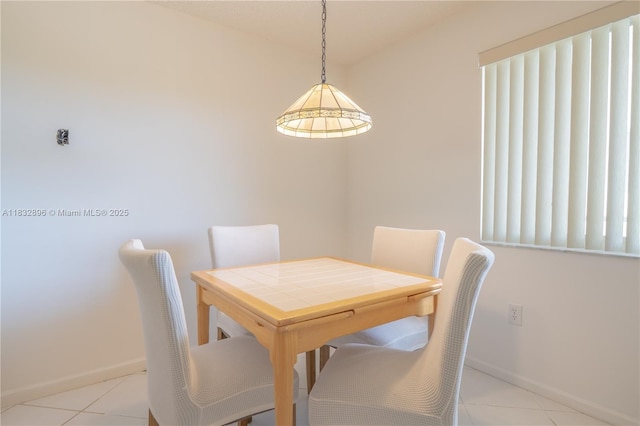 2541 N Nob Hill Rd Unit 309, Sunrise, FL 33322 - dining room with light tile patterned floors and baseboards