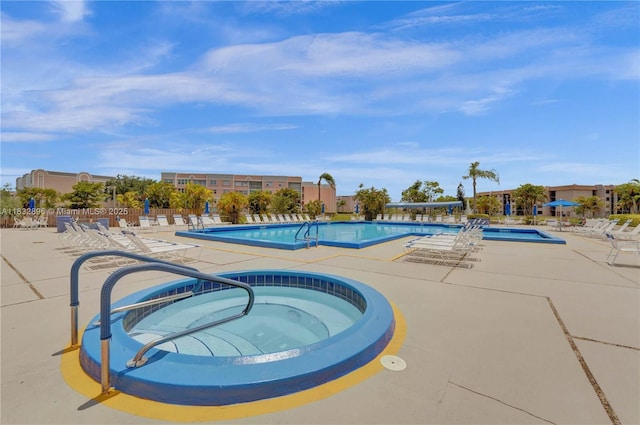 2541 N Nob Hill Rd Unit 309, Sunrise, FL 33322 - community pool with a hot tub and a patio area