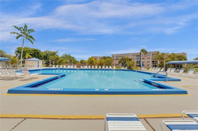 2541 N Nob Hill Rd Unit 309, Sunrise, FL 33322 - community pool with a patio area