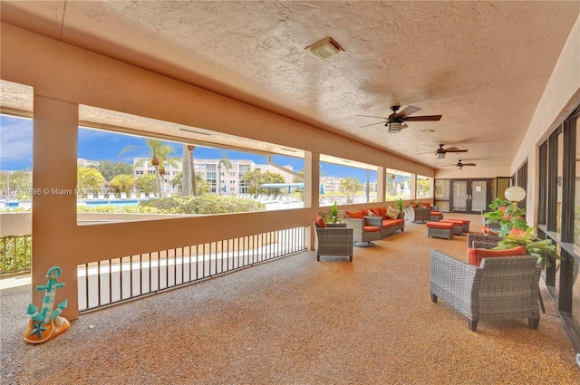 2541 N Nob Hill Rd Unit 309, Sunrise, FL 33322 - view of patio with an outdoor living space and ceiling fan