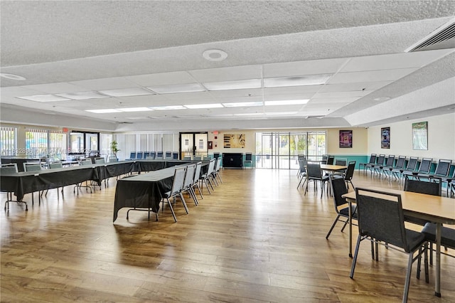 2541 N Nob Hill Rd Unit 309, Sunrise, FL 33322 - dining area featuring a paneled ceiling and wood finished floors