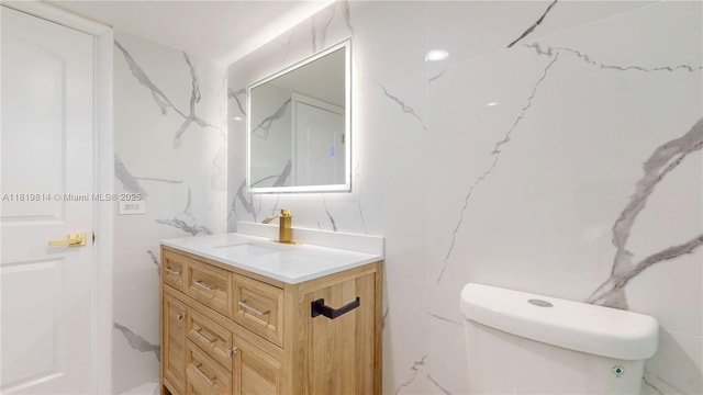 1333 E Hallandale Beach Blvd Unit 326, Hallandale Beach, FL 33009 - bathroom featuring vanity and tile walls