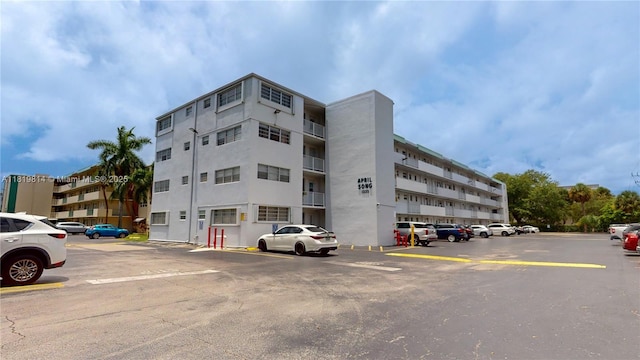 1333 E Hallandale Beach Blvd Unit 326, Hallandale Beach, FL 33009 - view of apartment building / complex with uncovered parking