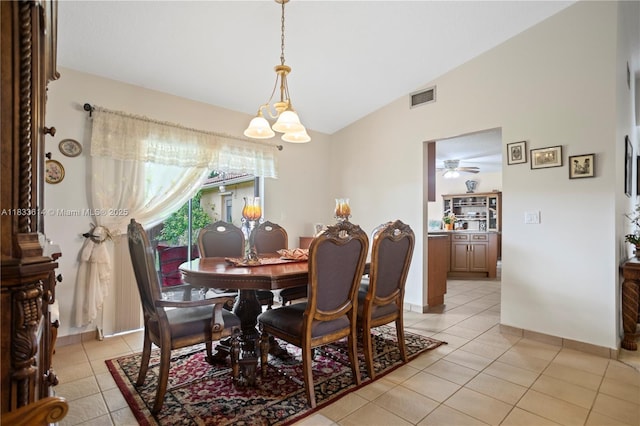 15824 Cotswold Ct, Davie, FL 33331 - dining space with light tile patterned floors, a ceiling fan, a chandelier, and high vaulted ceiling