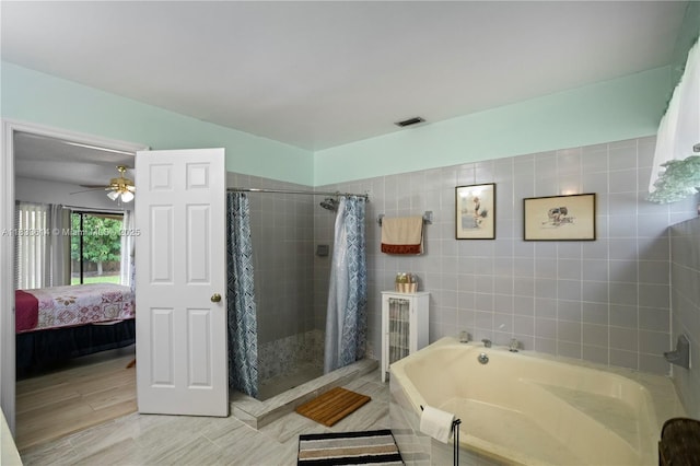 15824 Cotswold Ct, Davie, FL 33331 - bathroom featuring a garden tub, ensuite bathroom, a stall shower, and ceiling fan