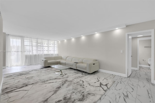 251 174th St Unit 1415, Sunny Isles Beach, FL 33160 - living area featuring marble look tile flooring and recessed lighting