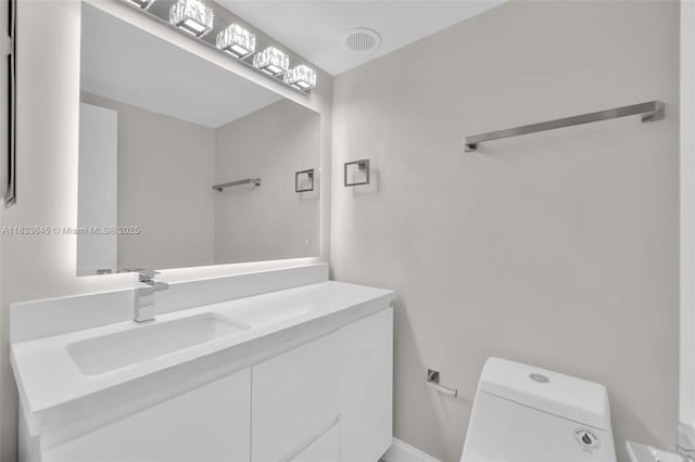 251 174th St Unit 1415, Sunny Isles Beach, FL 33160 - bathroom featuring toilet and vanity