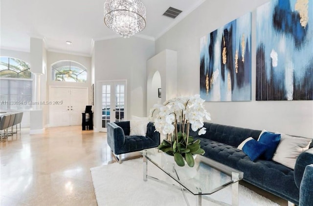 14095 NW 22nd Ct, Pembroke Pines, FL 33028 - living room featuring crown molding, a chandelier, a high ceiling, and french doors