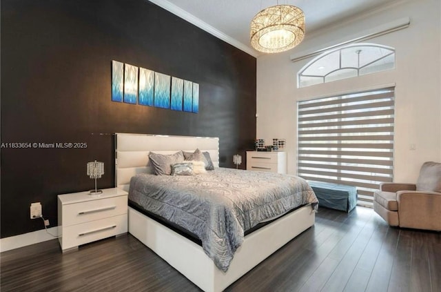 14095 NW 22nd Ct, Pembroke Pines, FL 33028 - bedroom featuring a chandelier, dark wood finished floors, and crown molding