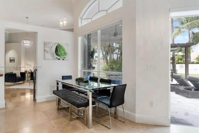 14095 NW 22nd Ct, Pembroke Pines, FL 33028 - dining area featuring plenty of natural light, a chandelier, and ceiling fan