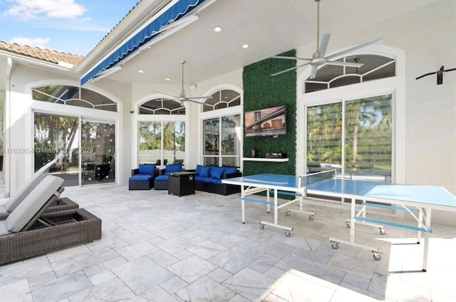 14095 NW 22nd Ct, Pembroke Pines, FL 33028 - view of patio / terrace featuring ceiling fan and an outdoor living space