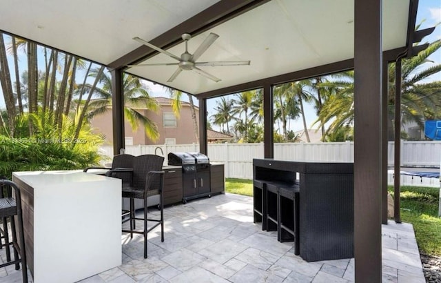 14095 NW 22nd Ct, Pembroke Pines, FL 33028 - fenced backyard with a grill, a patio area, and a ceiling fan