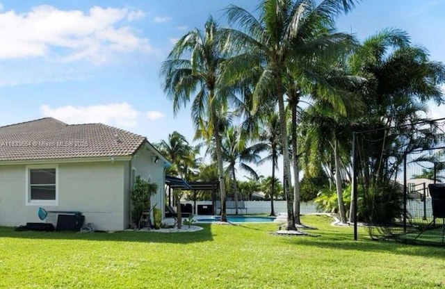 14095 NW 22nd Ct, Pembroke Pines, FL 33028 - view of yard with a pergola