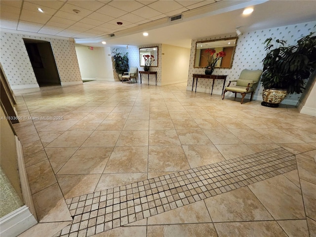 1101 River Reach Dr Unit 418, Fort Lauderdale, FL 33315 - lobby with wallpapered walls and a paneled ceiling