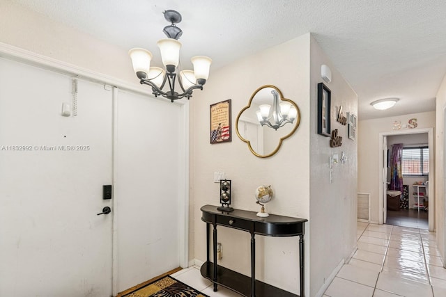 8107 NW 73rd Ter, Tamarac, FL 33321 - foyer entrance with a chandelier and light tile patterned floors