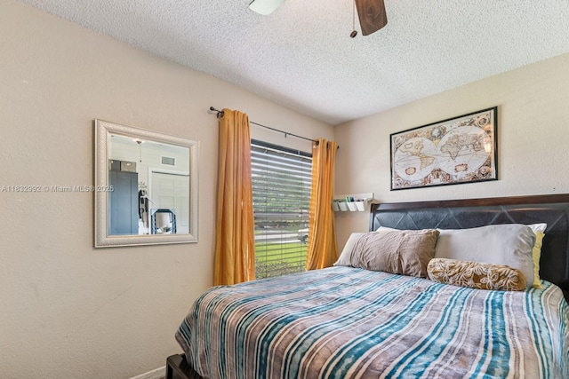 8107 NW 73rd Ter, Tamarac, FL 33321 - bedroom with a textured ceiling and ceiling fan