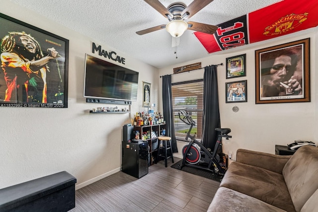 8107 NW 73rd Ter, Tamarac, FL 33321 - living room with a ceiling fan and a textured ceiling