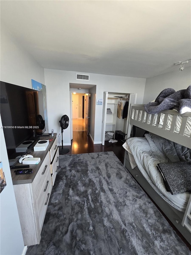 500 Bayview Dr Unit 732, Sunny Isles Beach, FL 33160 - bedroom featuring a closet and baseboards