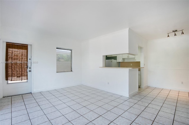 719 Euclid Ave Unit 7, Miami Beach, FL 33139 - unfurnished living room with light tile patterned flooring
