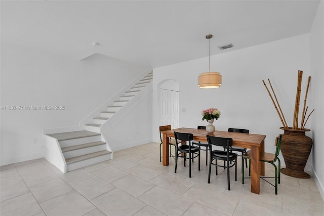 8242 NW 107th Ct Unit 7-12, Doral, FL 33178 - tiled dining space with stairway