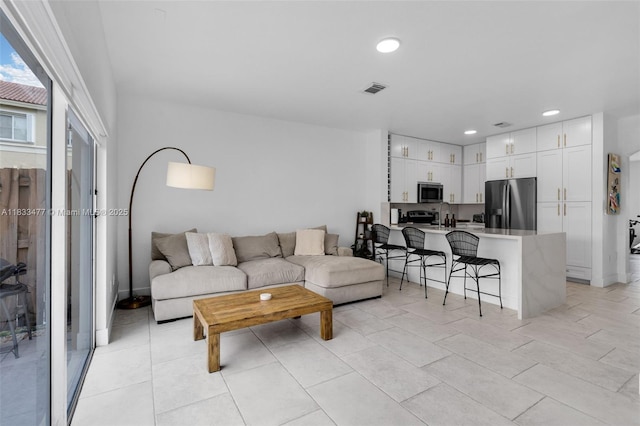 8242 NW 107th Ct Unit 7-12, Doral, FL 33178 - living room featuring recessed lighting