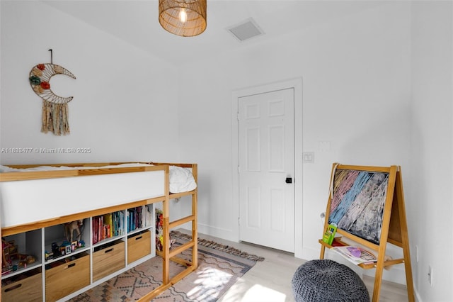 8242 NW 107th Ct Unit 7-12, Doral, FL 33178 - bedroom featuring wood finished floors and baseboards