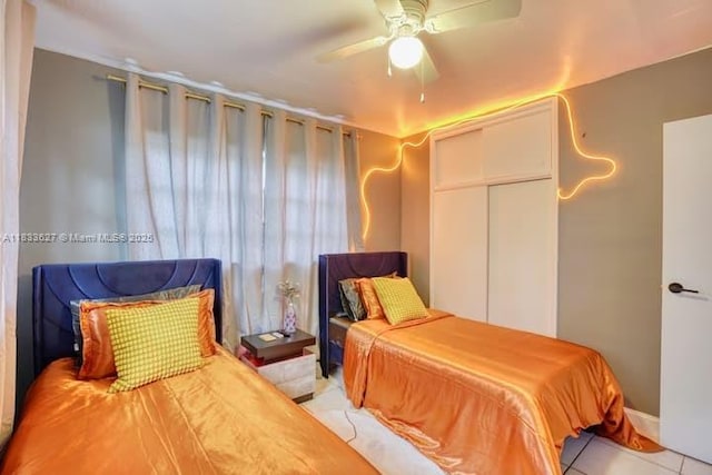 6443 Perry St, Hollywood, FL 33024 - tiled bedroom with ceiling fan and a closet