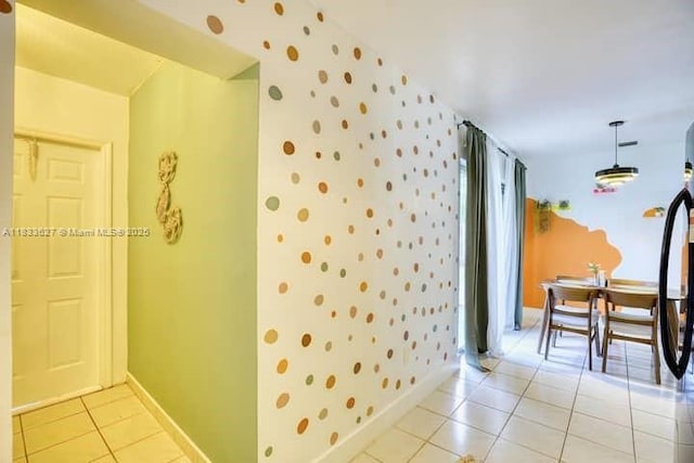 6443 Perry St, Hollywood, FL 33024 - bathroom with wallpapered walls and tile patterned floors