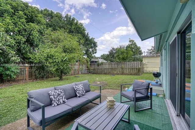 6443 Perry St, Hollywood, FL 33024 - fenced backyard featuring outdoor lounge area