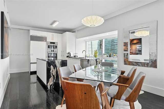 1435 Brickell Ave Unit 3512, Miami, FL 33131 - dining space with dark wood-style floors