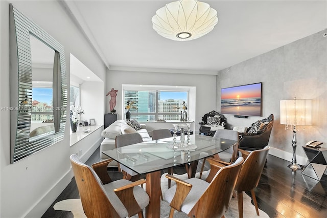 1435 Brickell Ave Unit 3512, Miami, FL 33131 - dining space featuring wood finished floors and baseboards